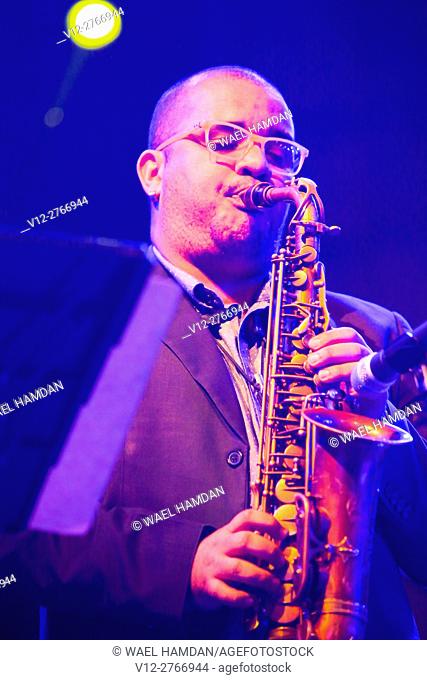 Latin American musician in Cairo jazz festival, Egypt  playing saxophones