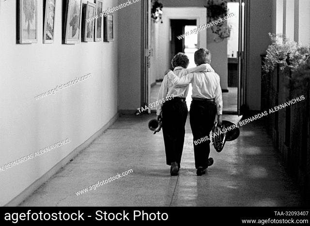 September, 1985. Klaipeda, Lithuanian SSR, USSR. Students of the Eduardas Balsys Art Boarding School walk down the corridor