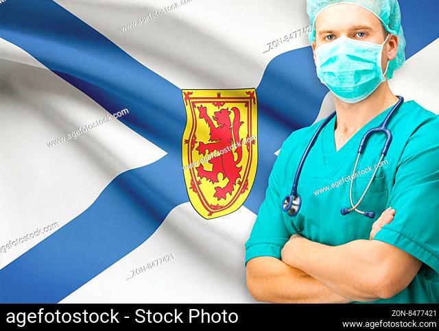 Surgeon with Canadian privinces flag on background - Nova Scotia
