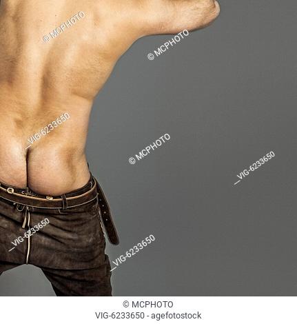 An image of a naked ass in bavarian leather pants - 01/01/2018