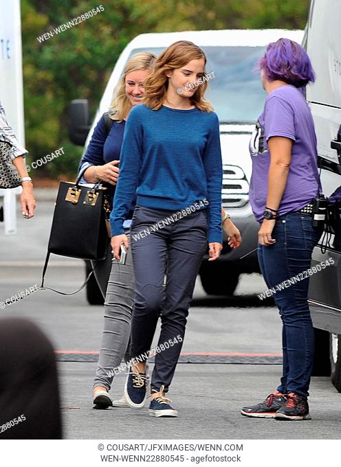 Actress Emma Watson spotted carrying a box of pastries after a long day on the set of her new movie ""The Circle"" filming in Azusa Ca