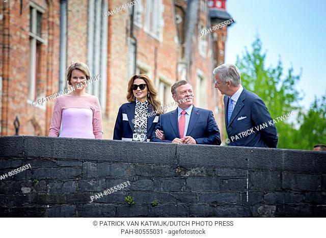 King Abdullah and Queen Rania of Jordan and King Philippe and Queen Mathilde of Belgium at a bridge at the Vismark (fish market) in Bruges, Belgium, 19 May 2016