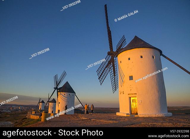 Windmills at dusk. Alcazar de San Juan, Ciudad Real province, Castilla La Mancha, Spain