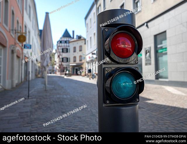 27 April 2021, Rhineland-Palatinate, Trier: An older type of bollard stands on a street in the pedestrian zone in Trier. The city wants to better protect the...