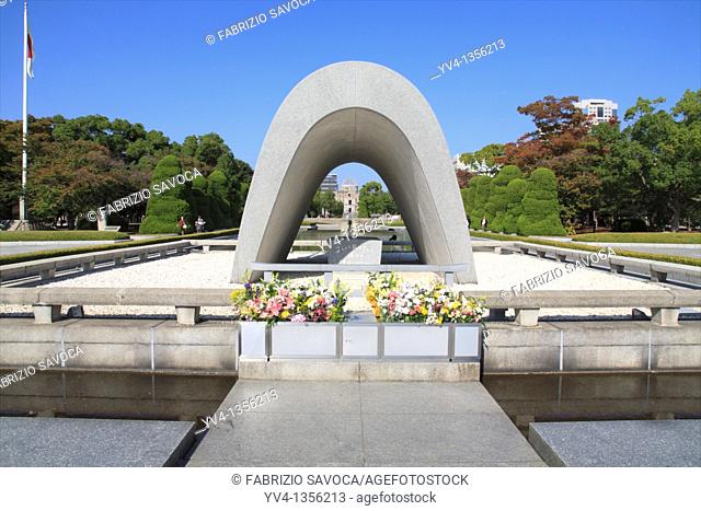 Memorial Cenotaph, Hiroshima Peace Memorial Park, Hiroshima, Japan  Near the center of the park is a concrete saddle shaped monument that covers a Cenotaph...