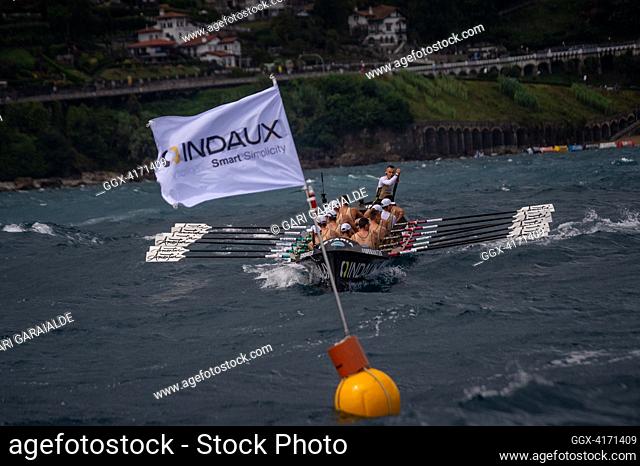 Crew of Getaria rowing boat in action during XIV. Getariako Ikurrina men’s regatta of the ACT League (The Association of Clubs of rowing boats)