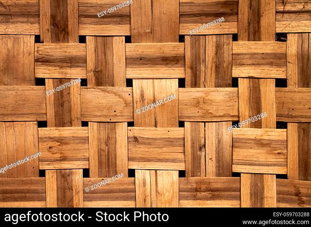 Wickerwork texture background. Antique wickerwork pattern used for fish baskets. Wooden strips Close up
