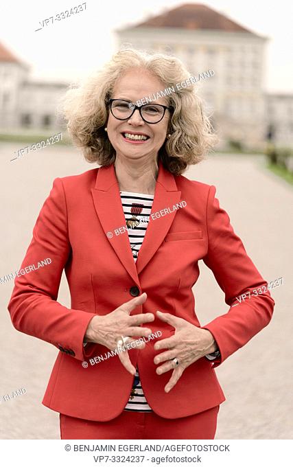 lively senior woman (67 years old), in Nymphenburg, Munich, Germany