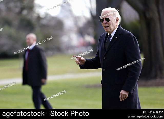 United States President Joe Biden walks on the South Lawn of the White House after arriving on Marine One in Washington, DC, US, on Tuesday, December 19, 2023