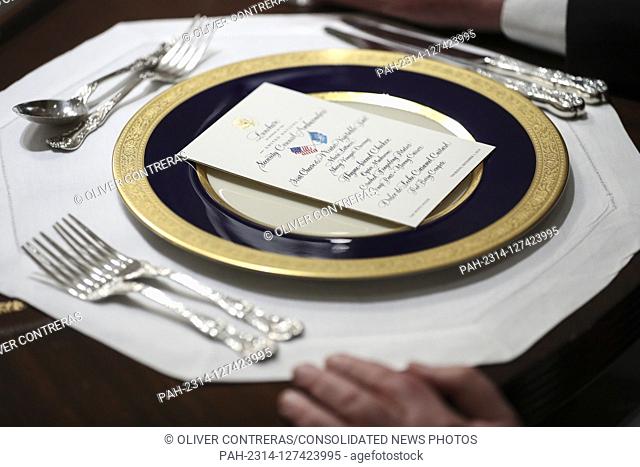 A place setting with a menu sits on a table in the Cabinet Room during a luncheon with United States President Donald J. Trump and the Permanent Representatives...