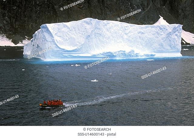 Ecological tourists in inflatable boat in Errera Channel