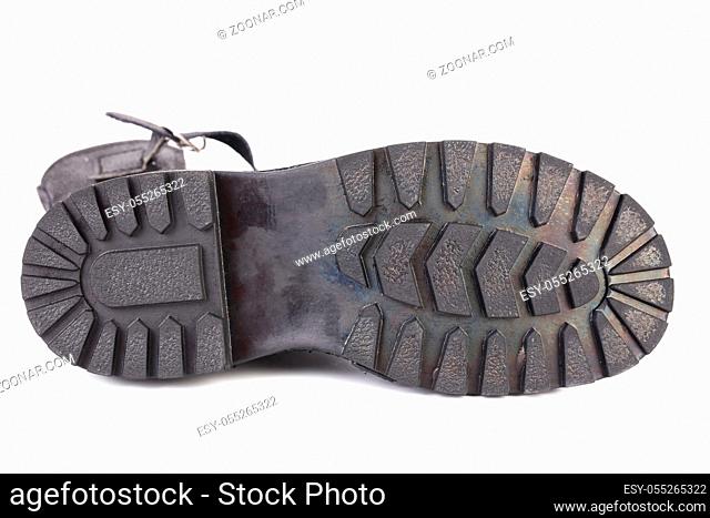 Close-up of black shoes sole. Isolated on white background
