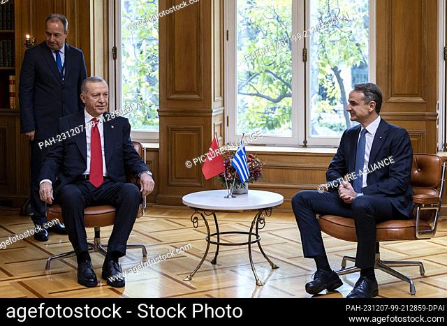 07 December 2023, Greece, Athen: Turkish President Recep Tayyip Erdogan meets Greek Prime Minister Kyriakos Mitsotakis during his official visit to Athens