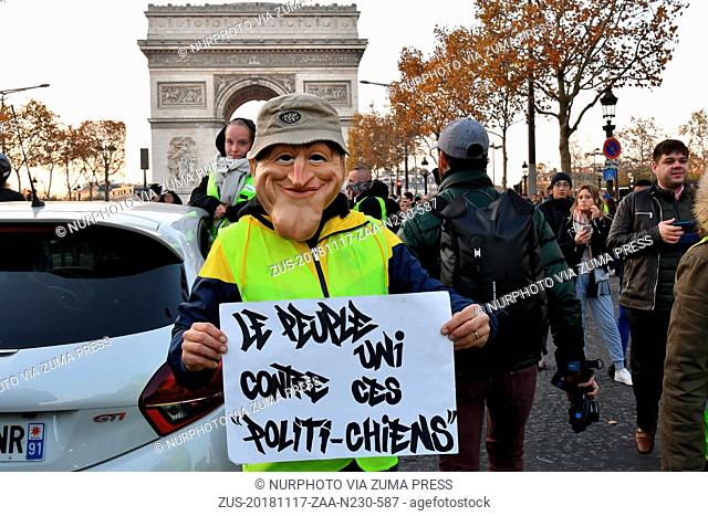November 17, 2018 - Paris, France - Protesters 'Yellow vests' who demonstrate on Champs-Elysées to answer the call on social networks to howl there fed up of...