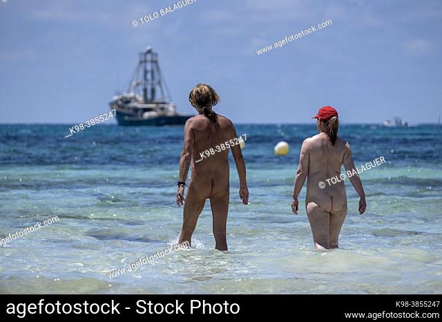 nudist couple bathing, Es Trenc beach, Campos municipality, Mallorca, Balearic Islands, Spain