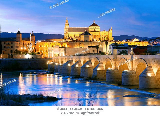 Arab mosque, Roman bridge and Guadalquivir river at dusk, Cordoba, Region of Andalusia, Spain, Europe