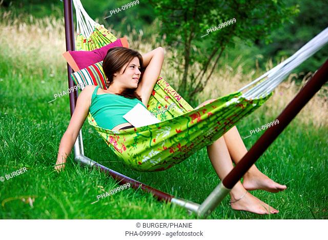 Girl lying in hammock