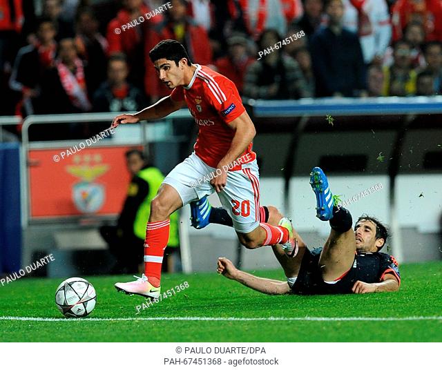 Lisbon's Goncalo Guedes (L) and Munich's Javi Martinez vie for the ball during the UEFA Champions League quarterfinal second leg soccer match between SL Benfica...