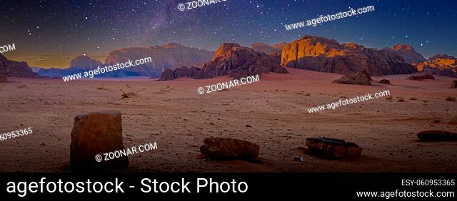 Desert and rocks on extraterrestrial or alien planet in the universe with view on space and galaxy. Sci-fi