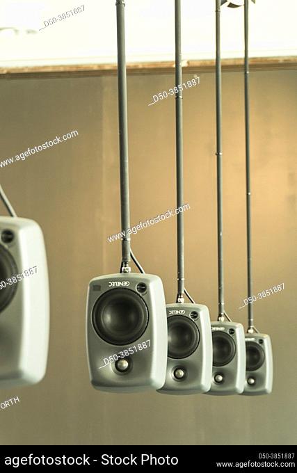 Boras, Sweden July 28, 2021 Sound speakers hanging form a ceiling at a art installation in the modern museum