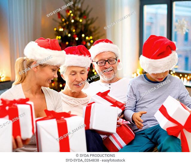 happy family with christmas gifts at home