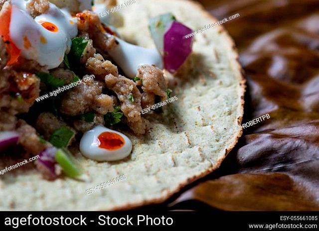 Vegetarian vegan ceviche on toasted tortillas. Mexican ceviche made of texturized vegetable protein with lime juice, jalapeno, onion and cilantro