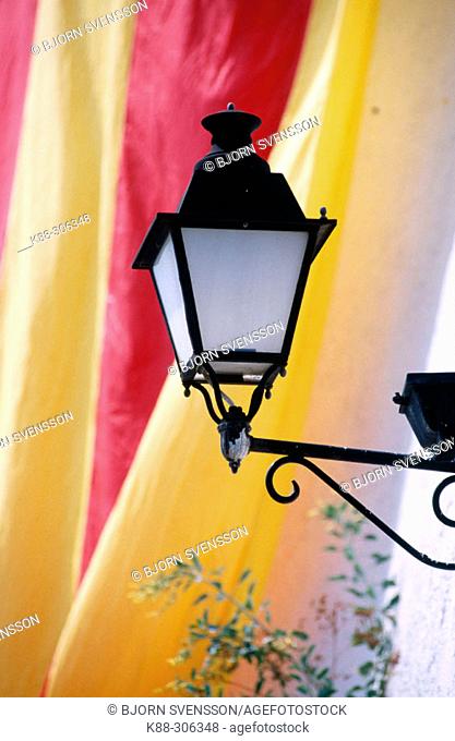 Street light with Catalan colors. Barcelona. Spain