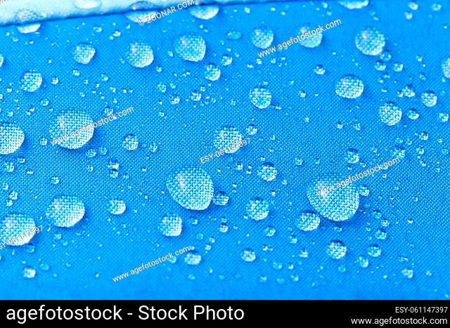 blue umbrella material, with raindrops, rainproof materials