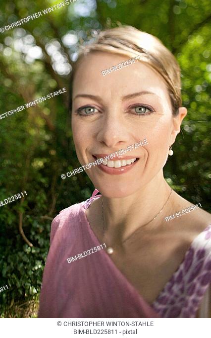 Smiling Caucasian woman looking at camera