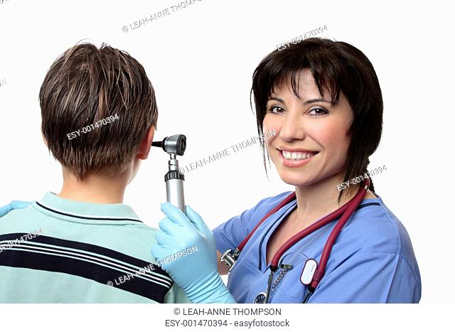 Doctor checking ears with otoscope