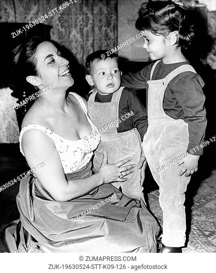 May 24, 1963; London, UK; Opera singer TERESA BERGANZA rehearsing for her appearance in the Gala Performance at the Royal Opera House, with her two children