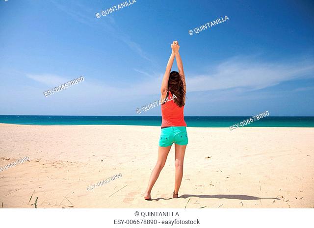 woman at beach of palmar in cadiz spain