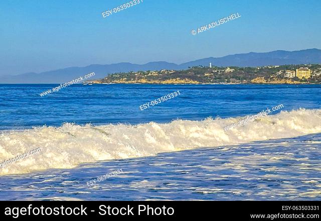 Extremely huge big surfer waves on the beach in Zicatela Puerto Escondido Oaxaca Mexico