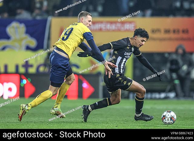 Union's Gustaf Nilsson and Charleroi's Mehdi Boukamir fight for the ball during a soccer match between Sporting Charleroi and Royale Union Saint-Gilloise RUSG