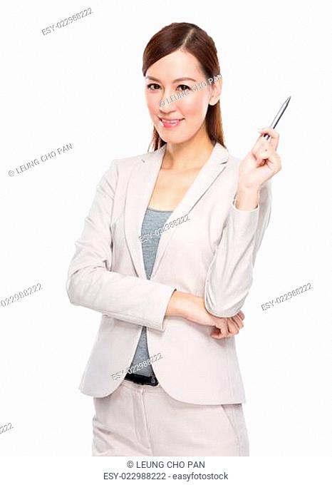 Businesswoman with pen up