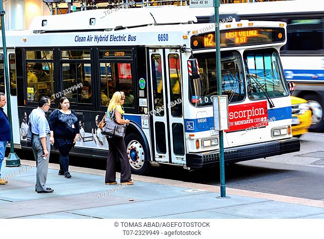 MTA Buses, public transportation, Mass Transit, Midtown Manhattan, 42nd Street, 5th Avenue, New York City, USA. M1, M2, M3, M4, M5 and Q32 bus stop