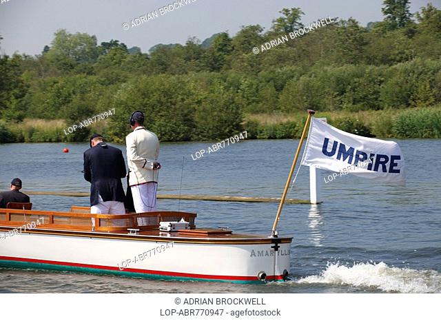 England, Oxfordshire, Henley-on-Thames, The umpire's boat following a race up the course at the annual Henley Royal Regatta