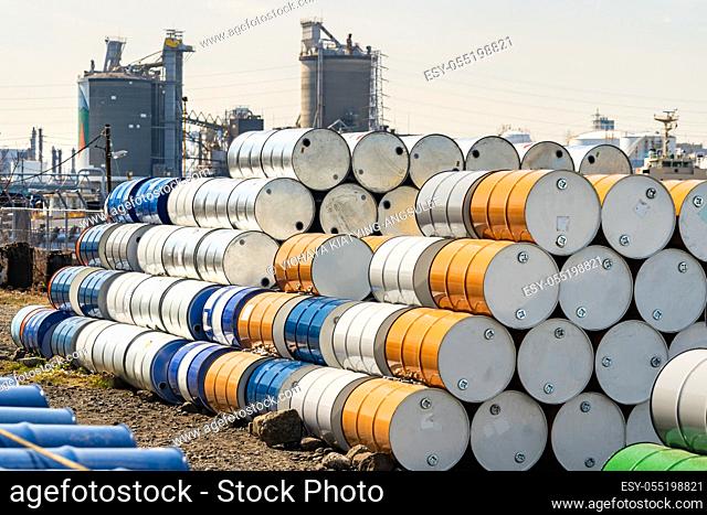 Industry oil chemical metal barrels stacked up in waste yard of tank and container, Kawasaki city near Tokyo Japan