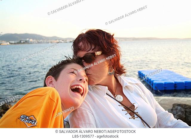 Mother and son at sunset, Ibiza, Balearic Islands, Spain