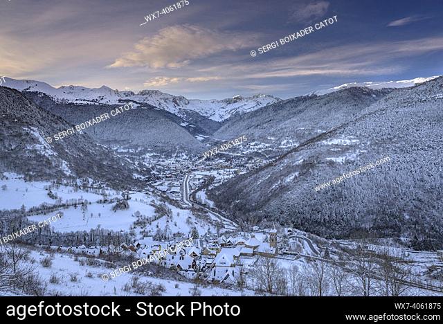 Sunrise over Vielha and Mijaran seen from the village of Mont, after a winter snowfall (Aran Valley, Catalonia, Spain, Pyrenees)