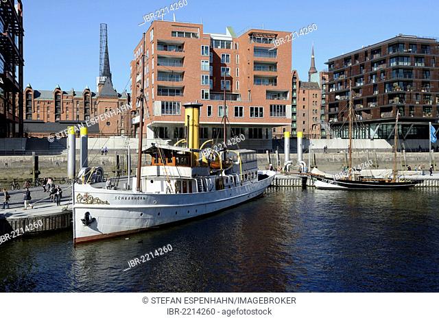Sailing ship and steamer Schaarhoer in the historic harbor, modern residential and office buildings, Sandtorkai, Sandtorhafen, Harbour City, Hamburg, Germany