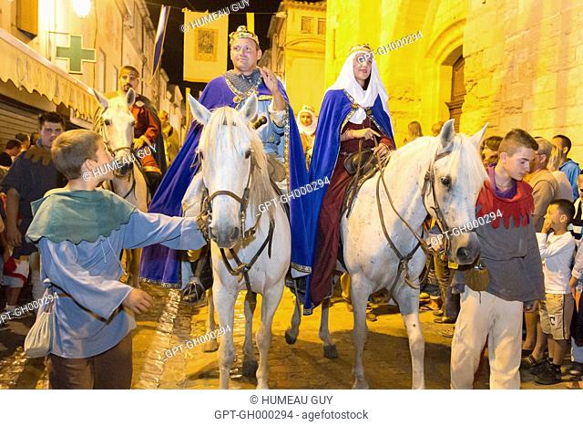 FESTIVAL OF SAINT LOUIS, THE RAMPARTS, ACTORS PLAYING LOUIS IX AND THE QUEEN ENTER THROUGH THE CITY TO GREET HIS PEOPLE BEFORE LEAVING ON THE CRUSADE