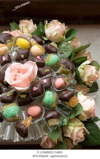 A bouquet of roses with pralines
