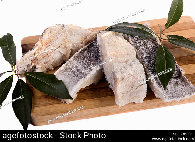 View of a bunch of sliced salted codfish isolated on a white background