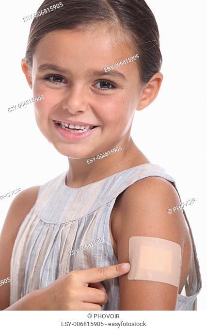 A girl wearing an adhesive bandage