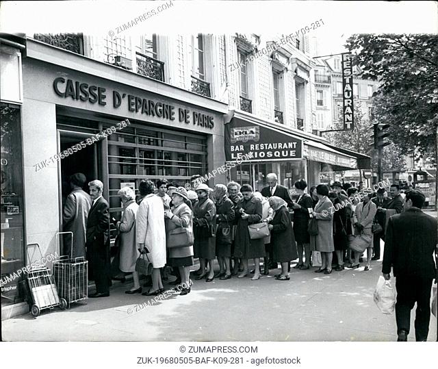 May 05, 1968 - The French Crisis - Paralysis Hits Paris As The Nation-Wide Strikes Spreads. Photo shows Parisians form queues outside to draw money before the...