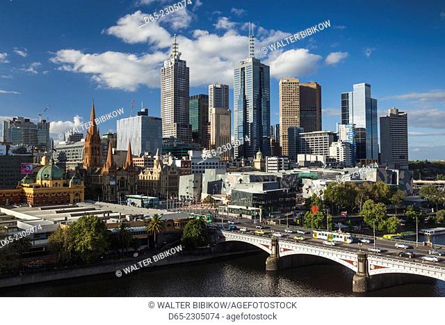 Australia, Victoria, VIC, Melbourne, skyline with Yarra River and Princess Bridge, late afternoon, elevated view