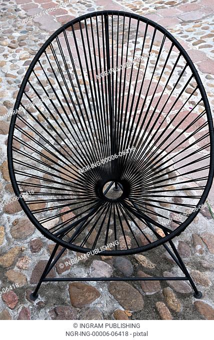 High angle view of a metal chair, Fabrica La Aurora, San Miguel de Allende, Guanajuato, Mexico