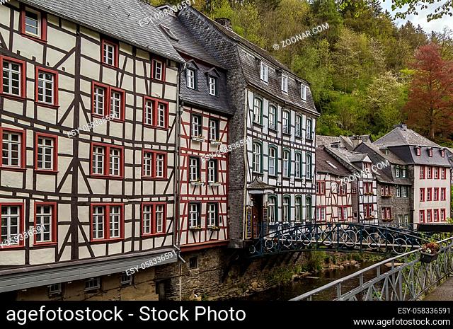 picturesque houses along the Rur River in the historic center of Monschau, Germany
