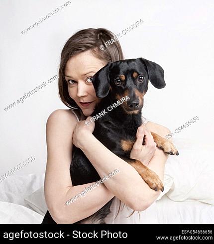 Portrait of a Woman with Brown Hair and her Dog